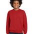 Gildan® - Youth Heavy Blend™ Crewneck Sweatshirt.  18000B Red